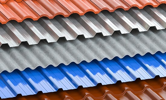 Different types of roof coating. Background from layers of sheet metal profiles, ceramic tiles, asphalt roofing shingles and gypsum slate.